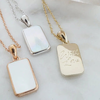 Moonlight Pendant Necklace in silver, gold, and rose gold with iridescent mother of pearl, featuring 'With Love' engraving.