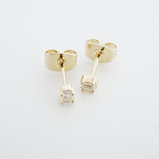 Gold-tone Crystal Baguette Studs, shown close up.