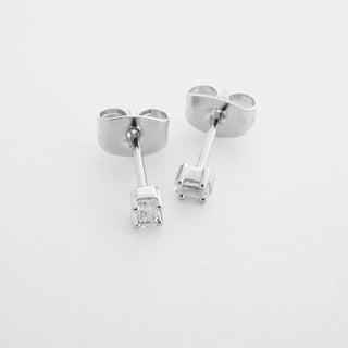 Silver-tone Crystal Baguette Studs, shown close up.
