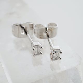 Silver-tone Crystal Baguette Studs, shown close up.