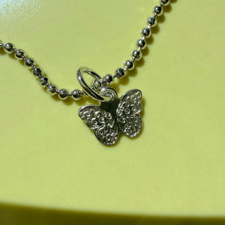 Sterling Silver Tiny Butterfly Charm