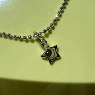 Sterling Silver Tiny Puffy Star Charm