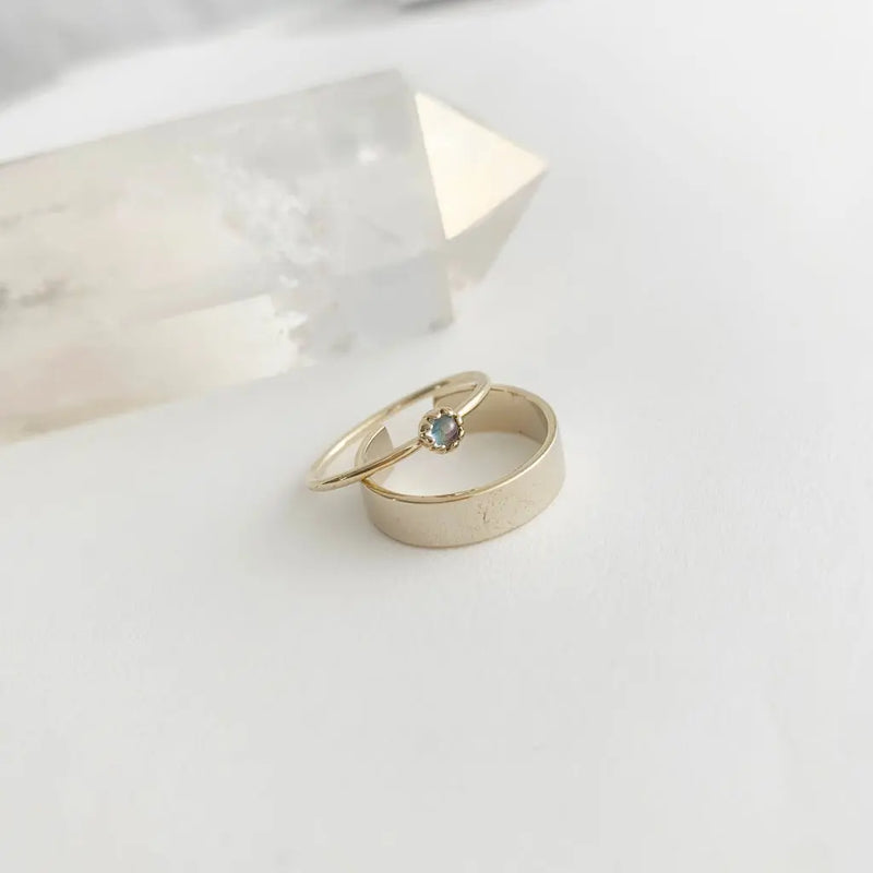 Gold vermeil solar mood ring with a petite color-changing stone, perfect for stacking or wearing solo.