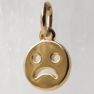 Woe Face Charm